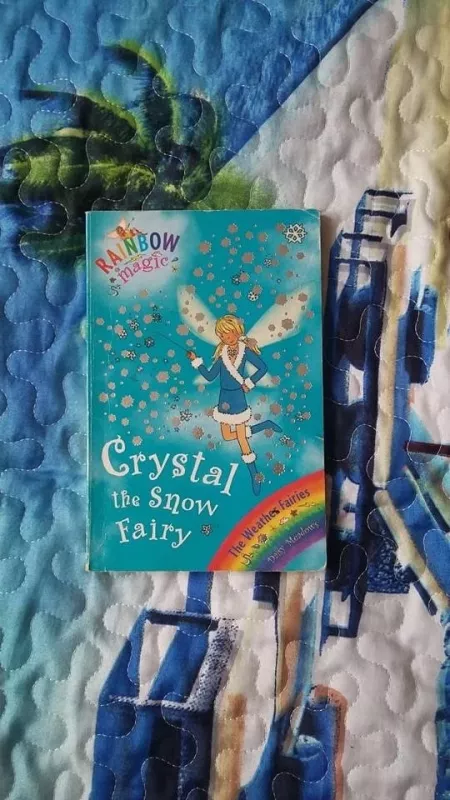 Crystal the snow fairy - Daisy Meadows, knyga