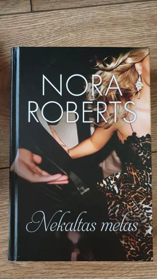 Nekaltas melas - Nora Roberts, knyga