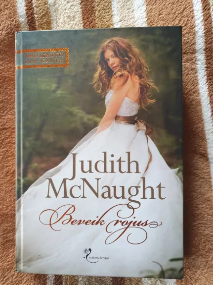 Beveik rojus - Judith McNaugth, knyga