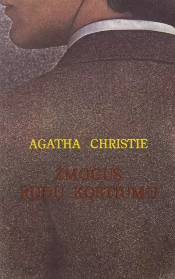 Žmogus rudu kostiumu