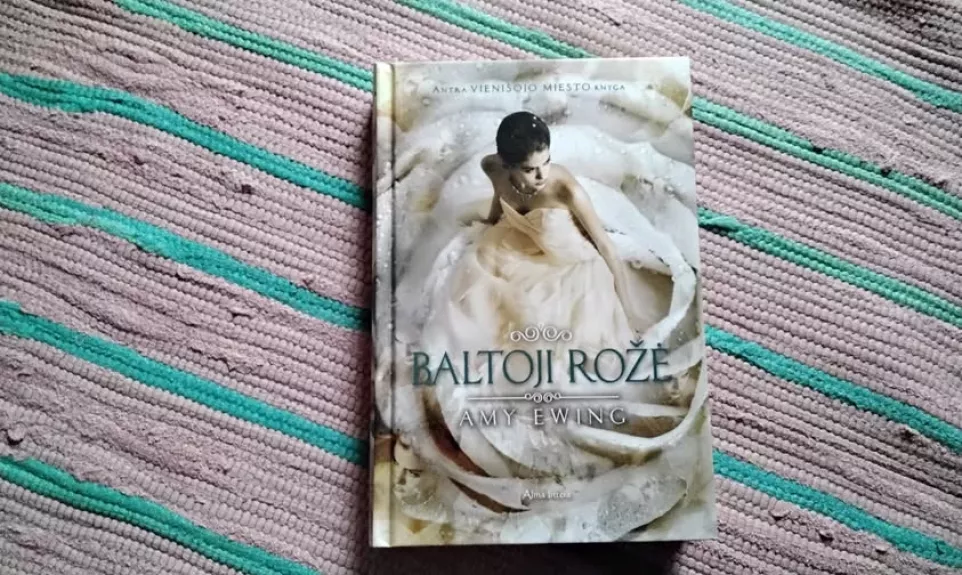 Baltoji rožė. 2-oji „Vienišojo miesto“ knyga