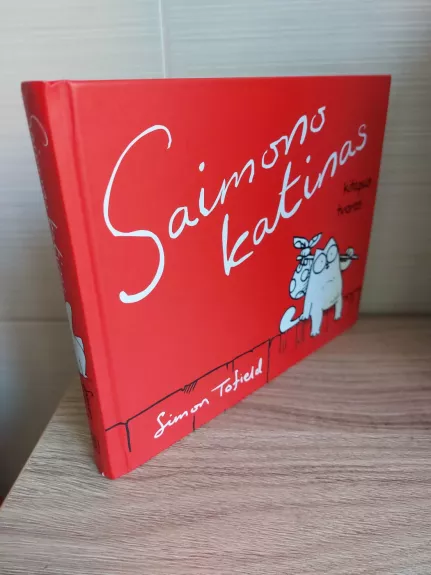 Saimono katinas kitapus tvoros