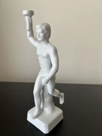 Olimpinės ugnies nešėjas bėgikas