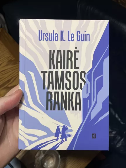 Kairė tamsos ranka