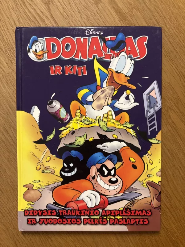 Donaldas ir kiti. Didysis traukinio apiplesimas ir juodosios pelkes paslaptis. - Walt Disney, knyga 2