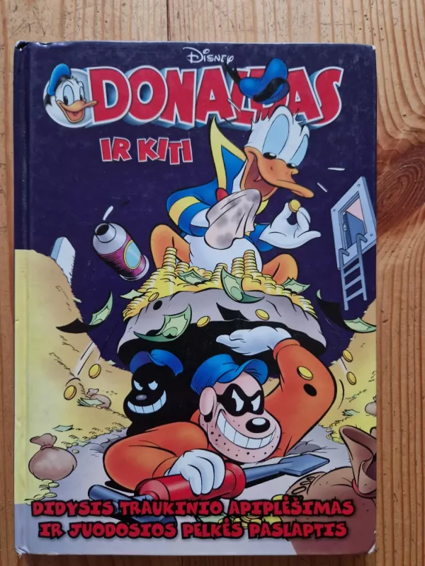 Donaldas ir kiti. Didysis traukinio apiplesimas ir juodosios pelkes paslaptis. - Walt Disney, knyga 2